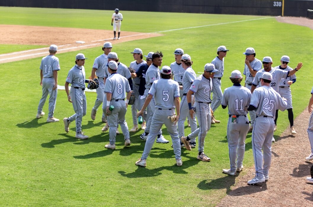 Casteel players gather along the field